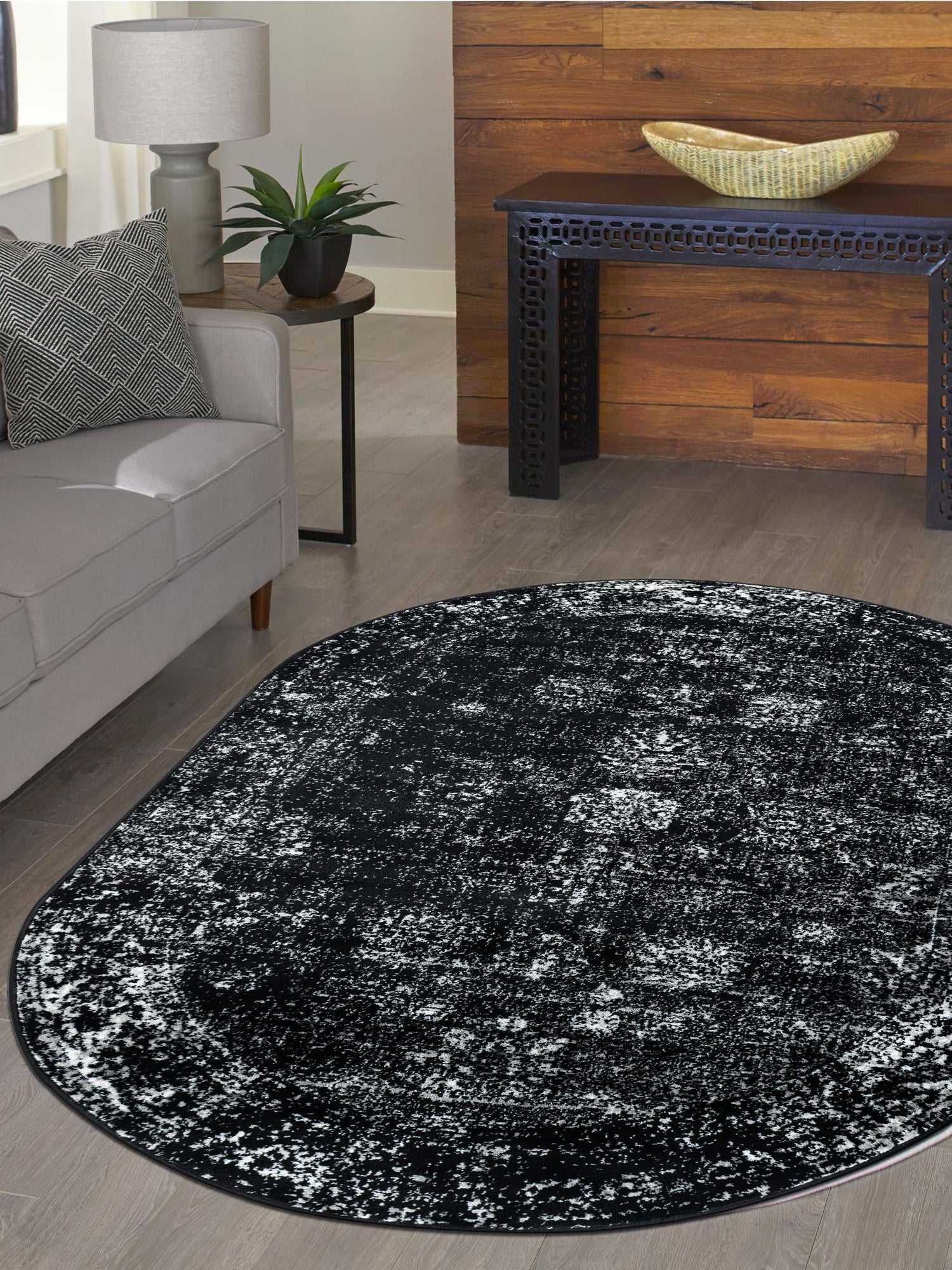 Black 5' 3 x 8' Sofia Oval Area Rug Durable Easy Clean Stain Resistant Unique Carpet for Affordable Interior Home Design for Sale at Rug Engine