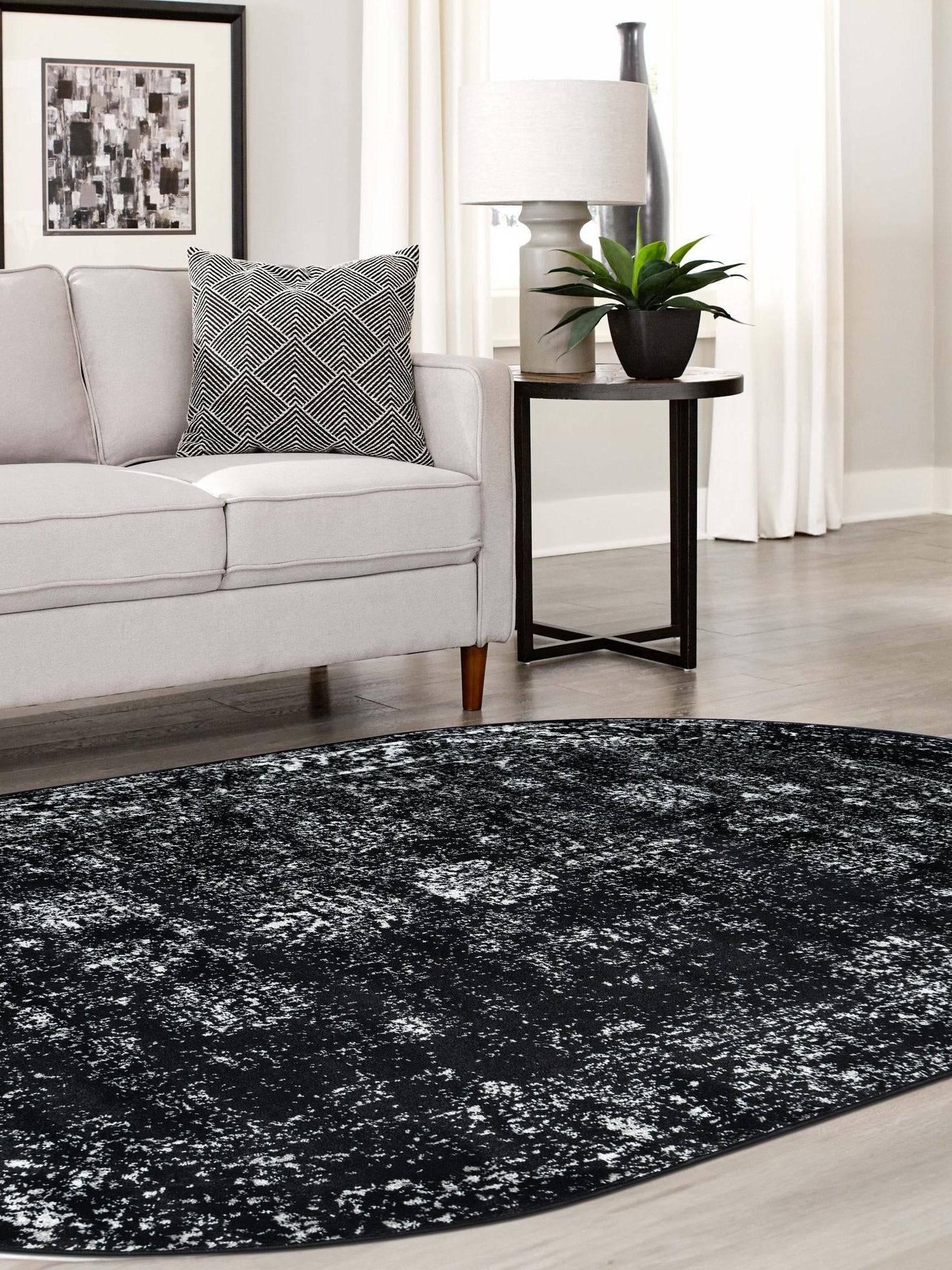 Black 4' 1 x 6' 1 Sofia Oval Area Rug Durable Easy Clean Stain Resistant Unique Carpet for Affordable Interior Home Design for Sale at Rug Engine