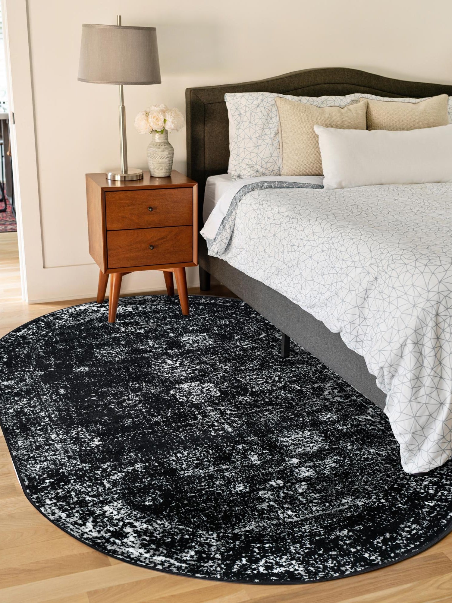 Black 5' 3 x 8' Sofia Oval Area Rug Durable Easy Clean Stain Resistant Unique Carpet for Affordable Interior Home Design for Sale at Rug Engine