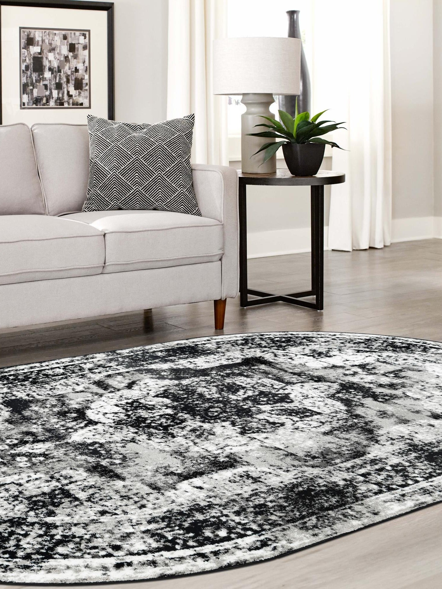 Black 5' 3 x 8' Sofia Oval Area Rug Durable Easy Clean Stain Resistant Unique Carpet for Affordable Interior Home Design for Sale at Rug Engine