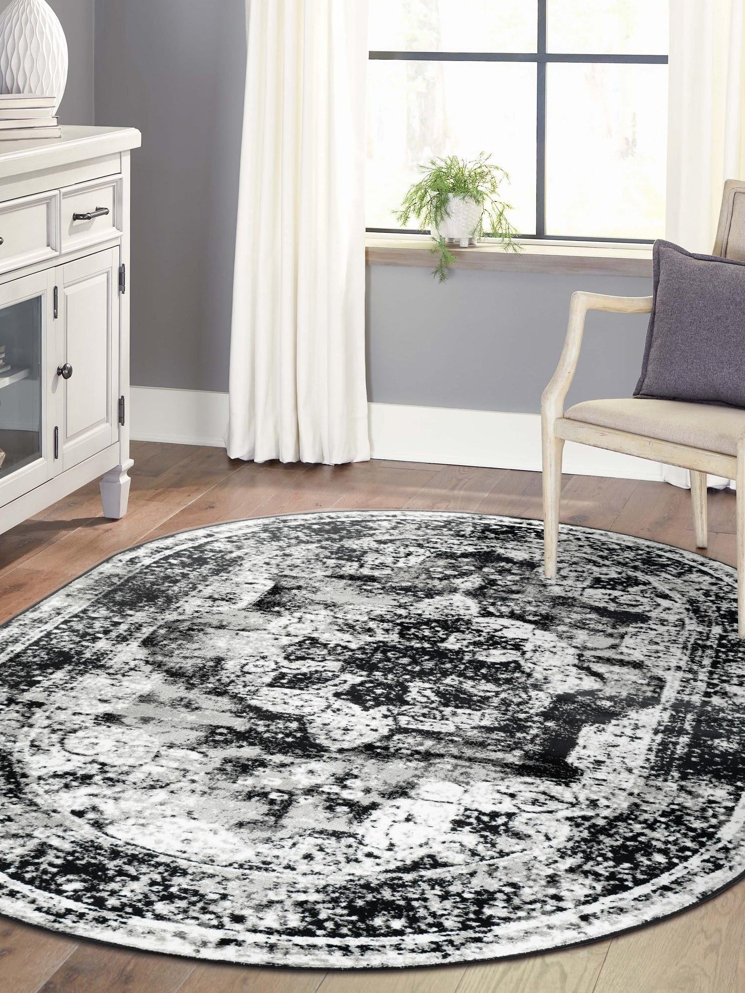Black 4' 1 x 6' 1 Sofia Oval Area Rug Durable Easy Clean Stain Resistant Unique Carpet for Affordable Interior Home Design for Sale at Rug Engine