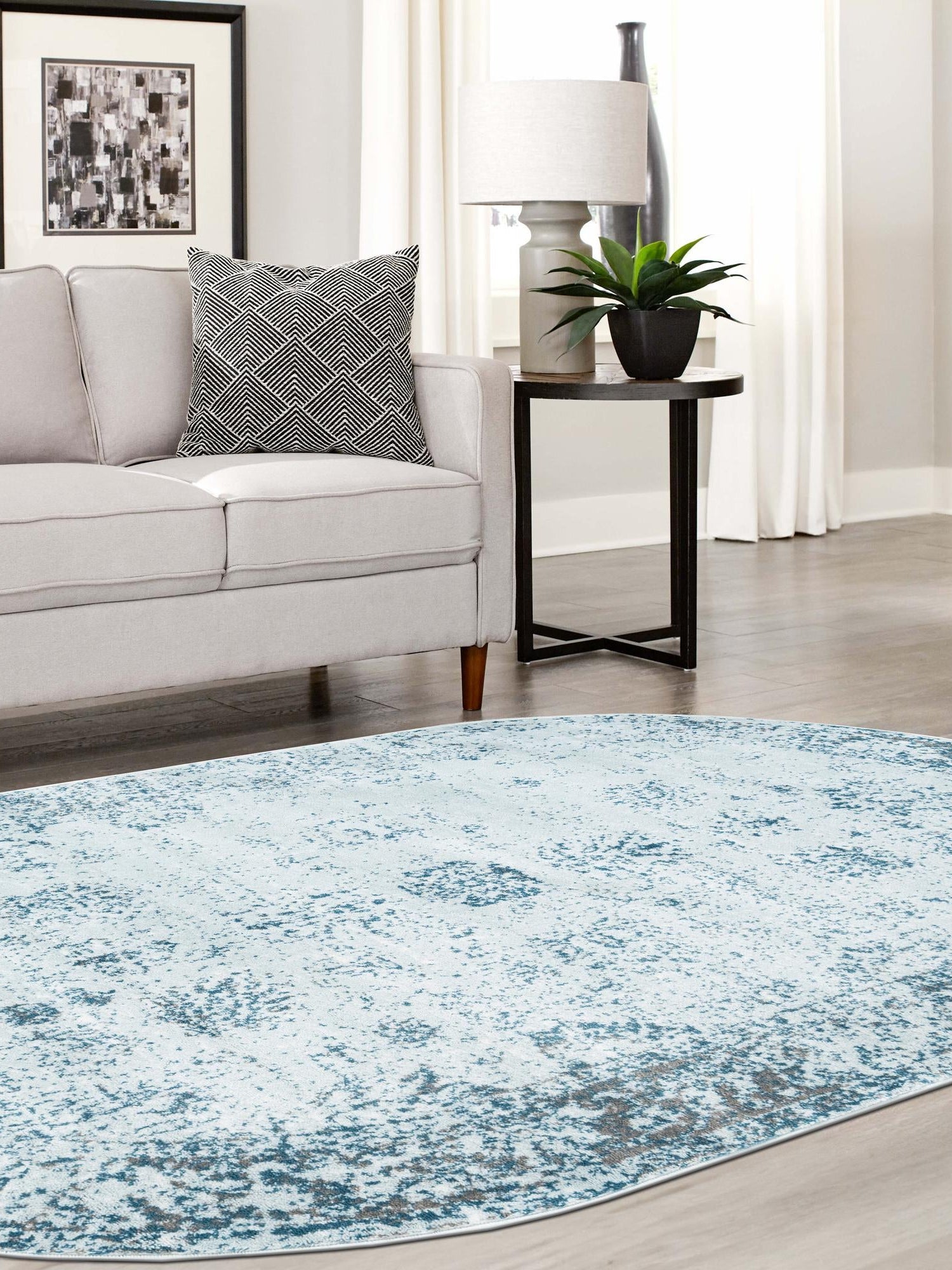 Light Blue 4' 1 x 6' 1 Sofia Oval Area Rug Durable Easy Clean Stain Resistant Unique Carpet for Affordable Interior Home Design for Sale at Rug Engine