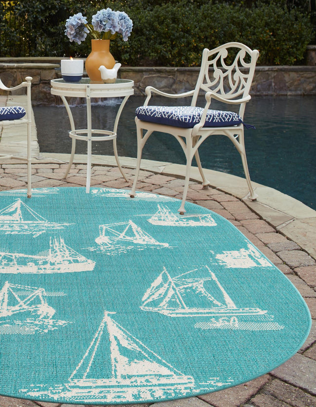 Teal 4' 1 x 6' 1 Outdoor Coastal Oval Area Rug Weather Resistant for Patio, Deck, Terrace, Balcony, Porch 100% Polypropylene Coastal Decor Carpet for Sale at Rug Engine