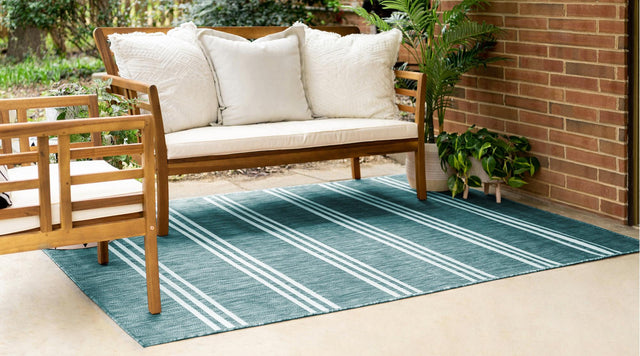 Teal 5' 3 x 8' Jill Zarin Outdoor Rectangle Area Rug Weather Resistant for Patio, Deck, Terrace, Balcony, Porch Durable 100% Polypropylene Carpet for Outside for Sale at Rug Engine