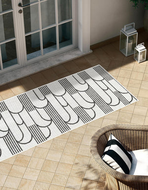 White and Black 2' x 8' Outdoor Modern Runner Area Rug Weather Resistant for Patio, Deck, Terrace, Balcony, Porch 100% Polypropylene Modern Outside Carpet for Sale at Rug Engine