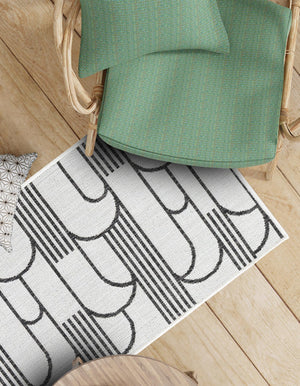 White and Black 2' x 6' 1 Outdoor Modern Runner Area Rug Weather Resistant for Patio, Deck, Terrace, Balcony, Porch 100% Polypropylene Modern Outside Carpet for Sale at Rug Engine
