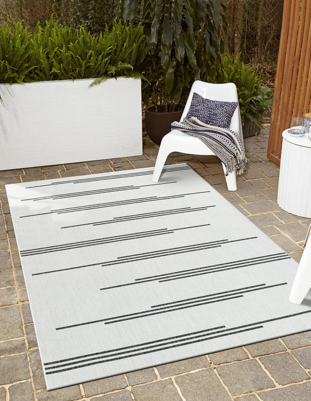 White and Black 4' 1 x 6' 1 Outdoor Modern Rectangle Area Rug Weather Resistant for Patio, Deck, Terrace, Balcony, Porch 100% Polypropylene Modern Outside Carpet for Sale at Rug Engine