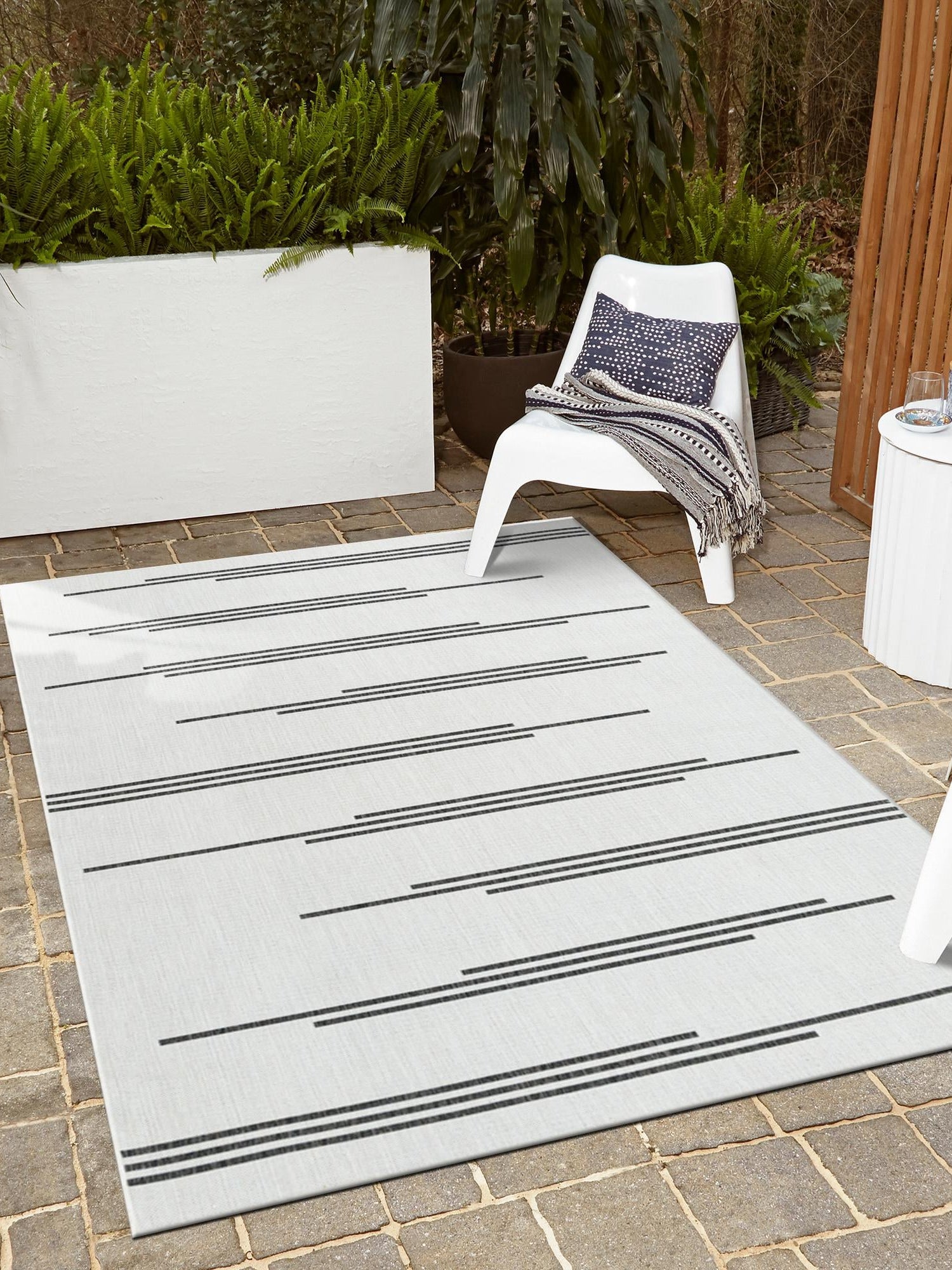 White and Black 6' 1 x 9' Outdoor Modern Rectangle Area Rug Weather Resistant for Patio, Deck, Terrace, Balcony, Porch 100% Polypropylene Modern Outside Carpet for Sale at Rug Engine