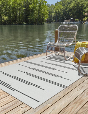 White and Black 6' 1 x 9' Outdoor Modern Rectangle Area Rug Weather Resistant for Patio, Deck, Terrace, Balcony, Porch 100% Polypropylene Modern Outside Carpet for Sale at Rug Engine
