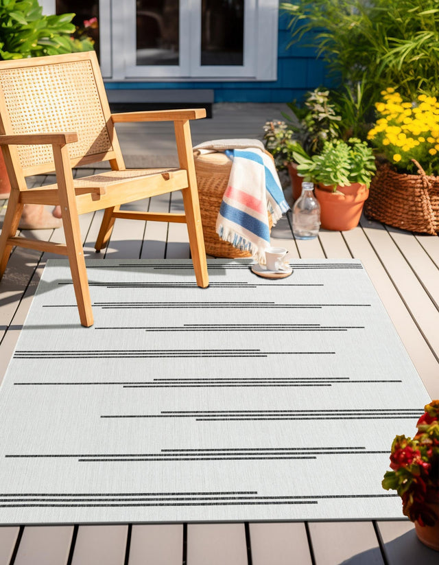 White and Black 5' 3 x 8' Outdoor Modern Rectangle Area Rug Weather Resistant for Patio, Deck, Terrace, Balcony, Porch 100% Polypropylene Modern Outside Carpet for Sale at Rug Engine