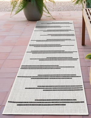 White and Black 2' x 6' 1 Outdoor Modern Runner Area Rug Weather Resistant for Patio, Deck, Terrace, Balcony, Porch 100% Polypropylene Modern Outside Carpet for Sale at Rug Engine