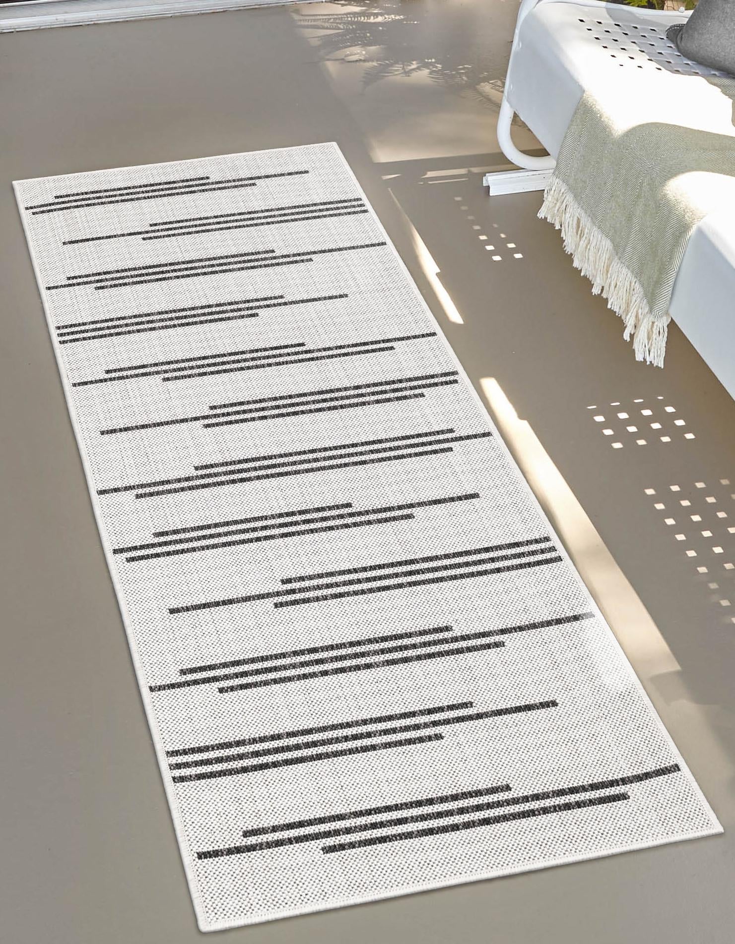 White and Black 2' x 5' 3 Outdoor Modern Runner Area Rug Weather Resistant for Patio, Deck, Terrace, Balcony, Porch 100% Polypropylene Modern Outside Carpet for Sale at Rug Engine