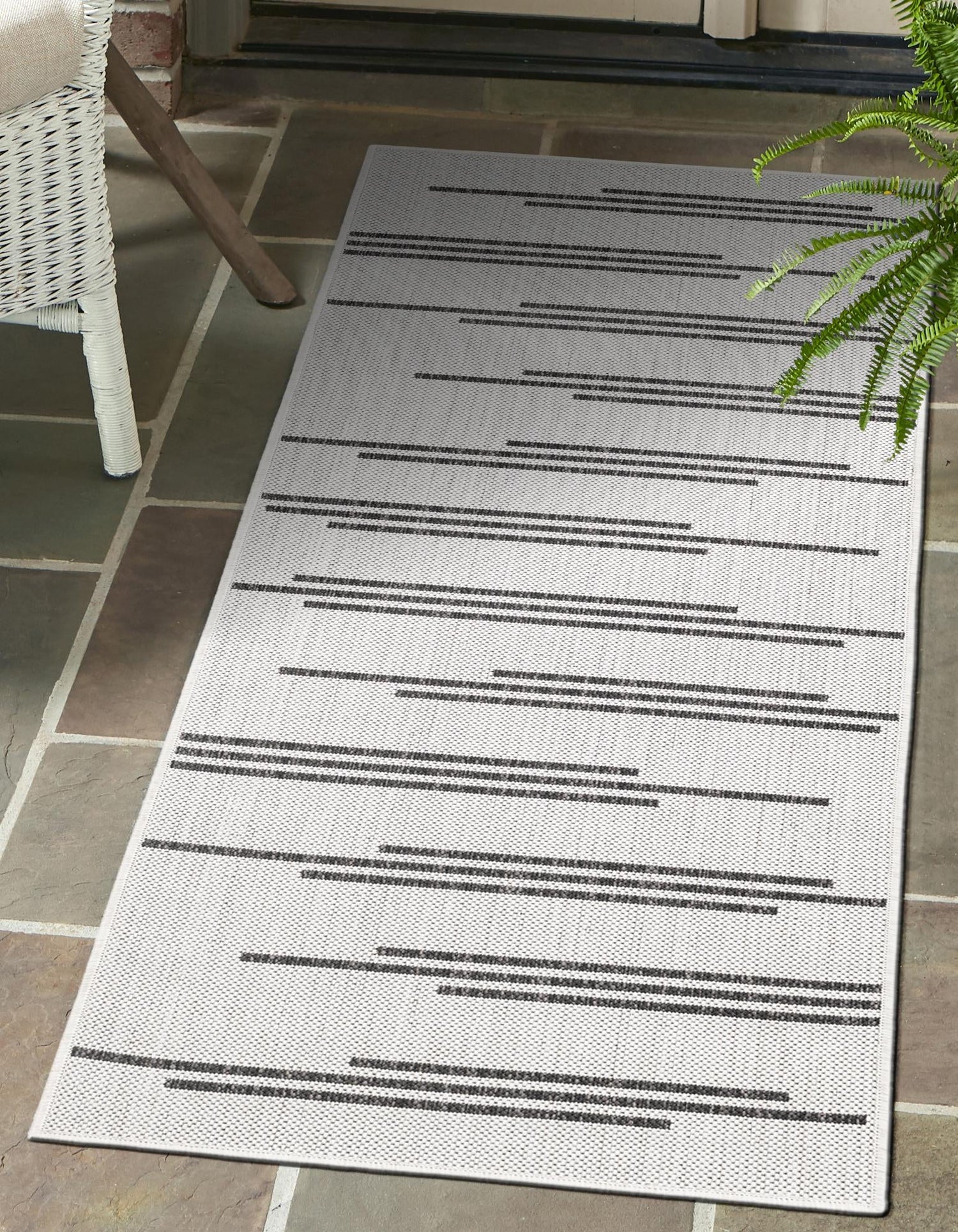 White and Black 2' x 8' Outdoor Modern Runner Area Rug Weather Resistant for Patio, Deck, Terrace, Balcony, Porch 100% Polypropylene Modern Outside Carpet for Sale at Rug Engine