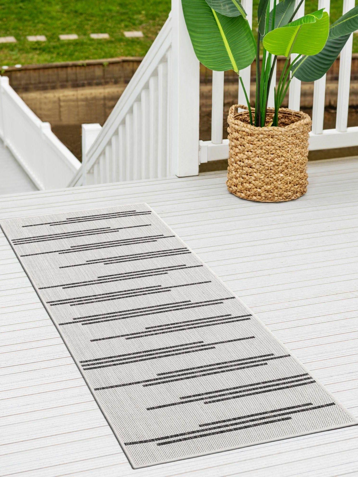 White and Black 2' x 6' 1 Outdoor Modern Runner Area Rug Weather Resistant for Patio, Deck, Terrace, Balcony, Porch 100% Polypropylene Modern Outside Carpet for Sale at Rug Engine