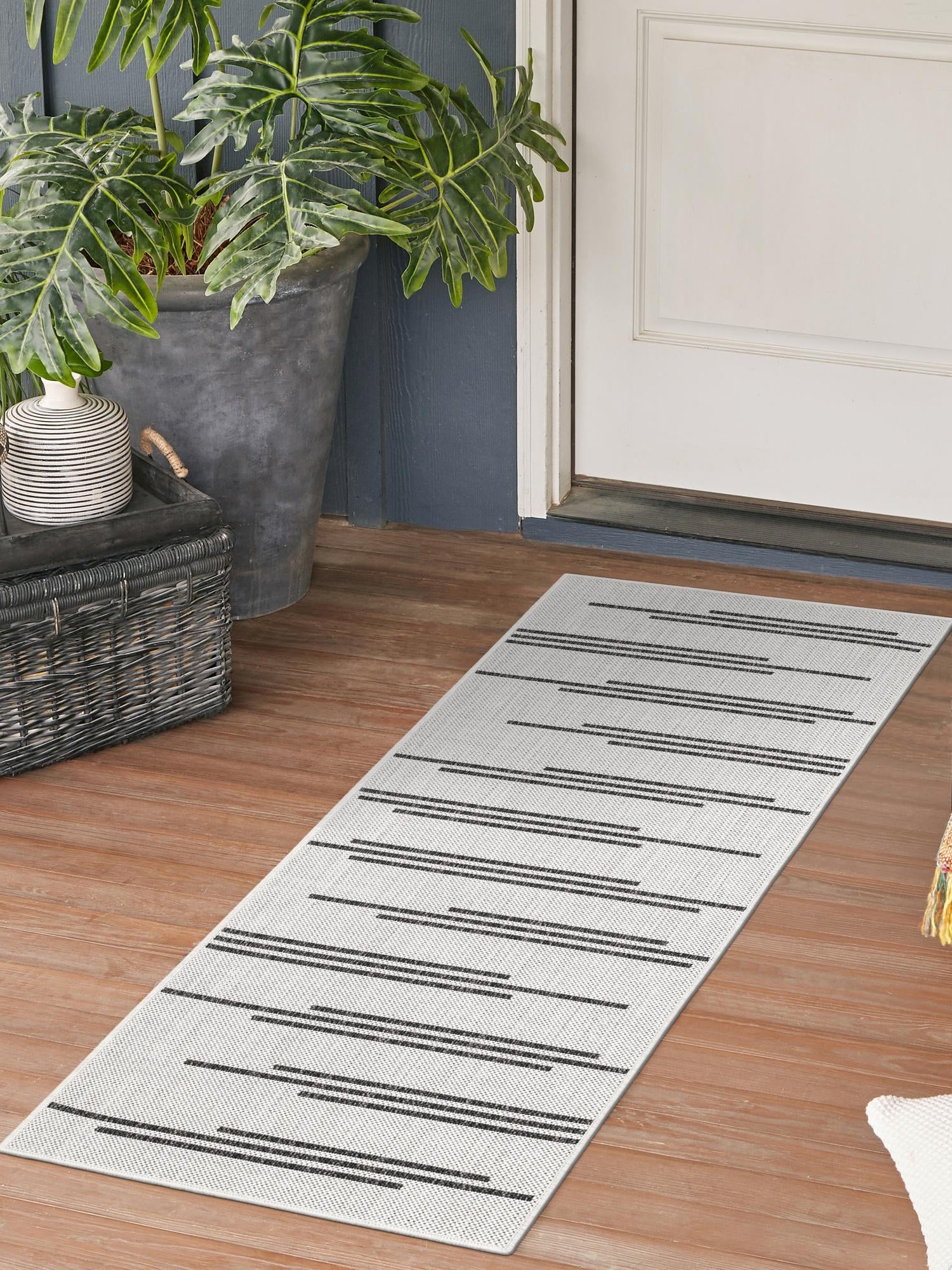 White and Black 2' x 5' 3 Outdoor Modern Runner Area Rug Weather Resistant for Patio, Deck, Terrace, Balcony, Porch 100% Polypropylene Modern Outside Carpet for Sale at Rug Engine