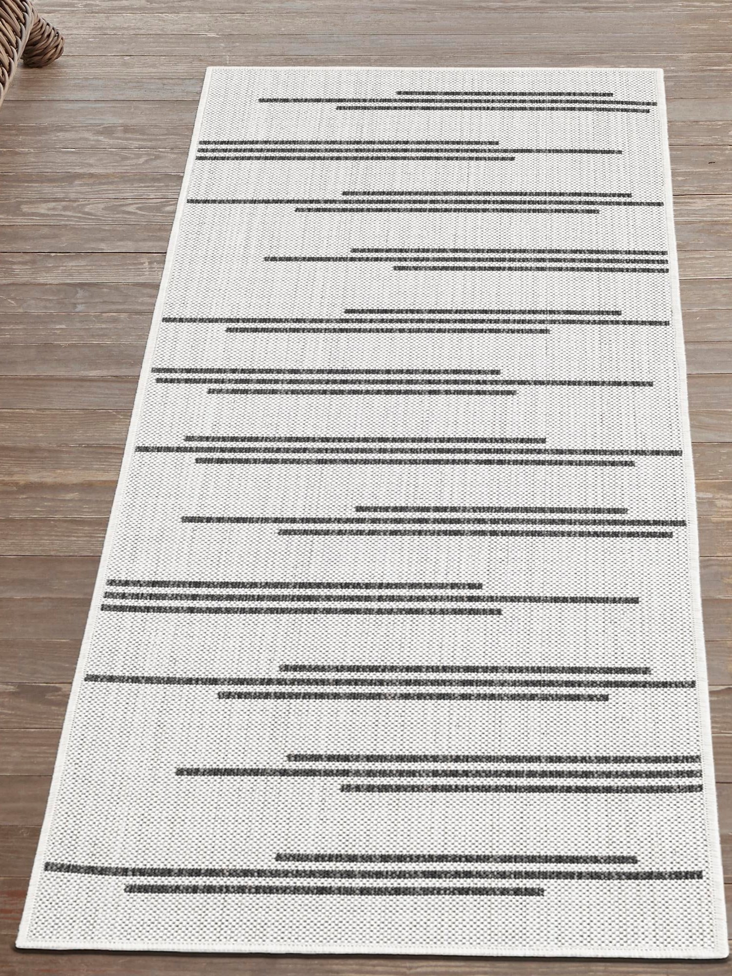 White and Black 2' x 6' 1 Outdoor Modern Runner Area Rug Weather Resistant for Patio, Deck, Terrace, Balcony, Porch 100% Polypropylene Modern Outside Carpet for Sale at Rug Engine