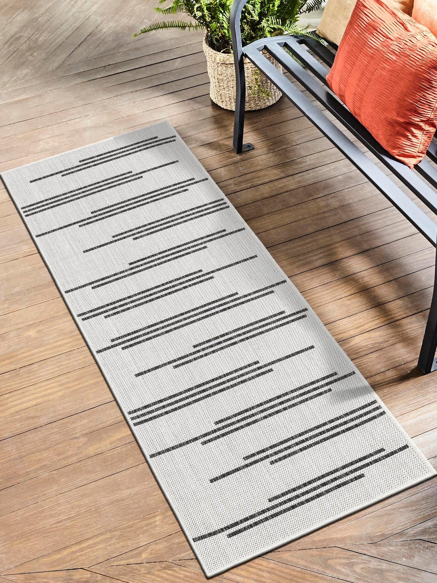 White and Black 2' x 6' 1 Outdoor Modern Runner Area Rug Weather Resistant for Patio, Deck, Terrace, Balcony, Porch 100% Polypropylene Modern Outside Carpet for Sale at Rug Engine