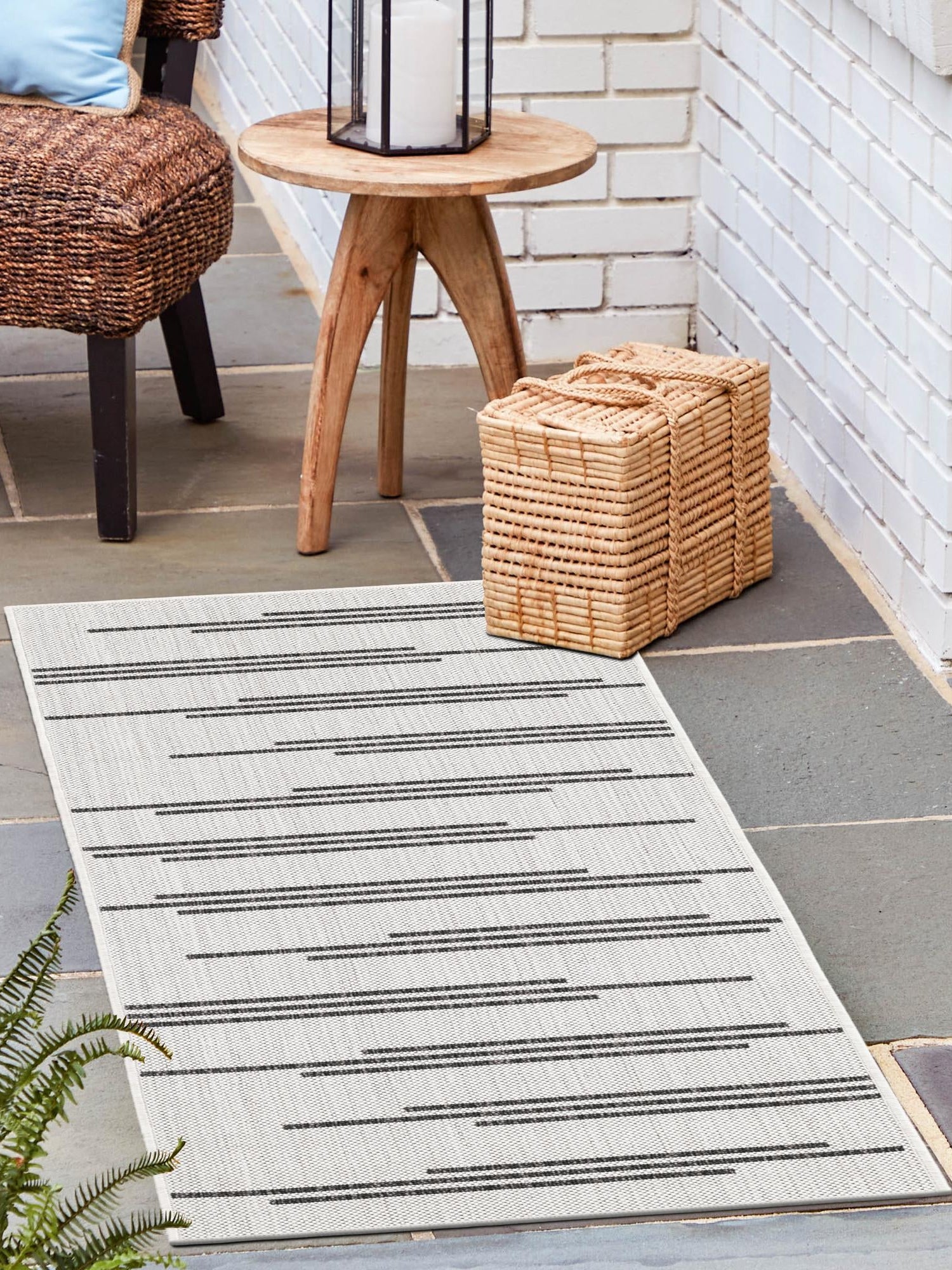 White and Black 2' x 6' 1 Outdoor Modern Runner Area Rug Weather Resistant for Patio, Deck, Terrace, Balcony, Porch 100% Polypropylene Modern Outside Carpet for Sale at Rug Engine