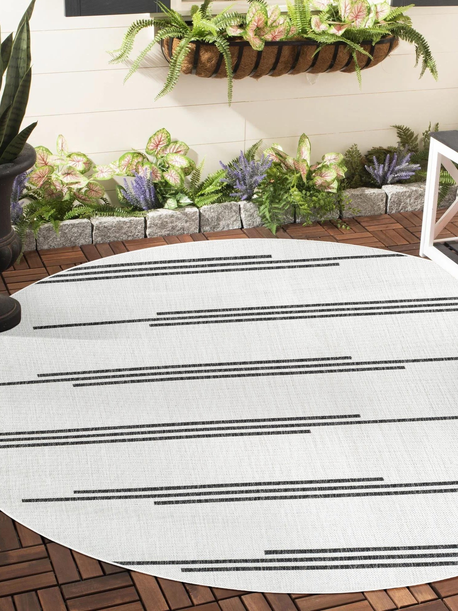 White and Black 4' 1 x 4' 1 Outdoor Modern Round Area Rug Weather Resistant for Patio, Deck, Terrace, Balcony, Porch 100% Polypropylene Modern Outside Carpet for Sale at Rug Engine