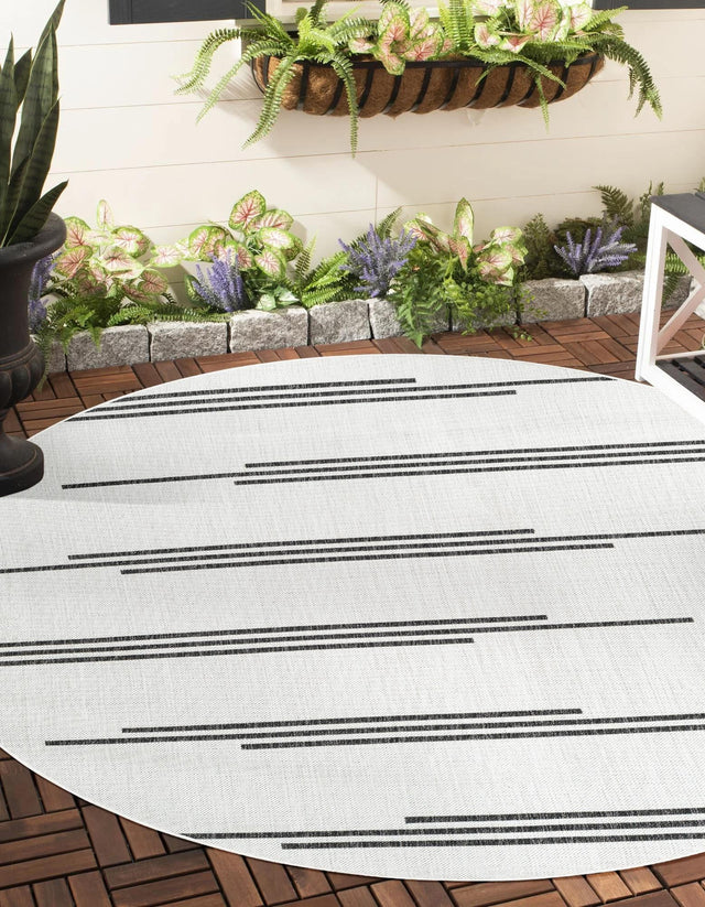 White and Black 6' 1 x 6' 1 Outdoor Modern Round Area Rug Weather Resistant for Patio, Deck, Terrace, Balcony, Porch 100% Polypropylene Modern Outside Carpet for Sale at Rug Engine
