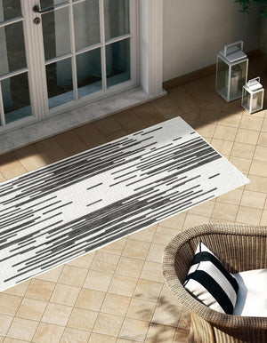 Black and White 2' x 6' 1 Outdoor Modern Runner Area Rug Weather Resistant for Patio, Deck, Terrace, Balcony, Porch 100% Polypropylene Modern Outside Carpet for Sale at Rug Engine