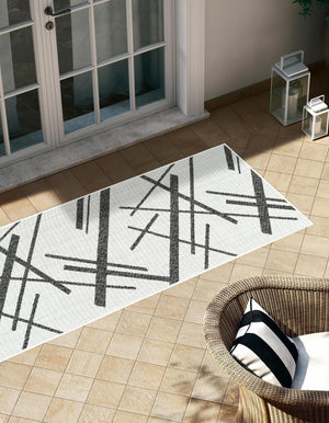 Black and White 2' x 8' Outdoor Modern Runner Area Rug Weather Resistant for Patio, Deck, Terrace, Balcony, Porch 100% Polypropylene Modern Outside Carpet for Sale at Rug Engine