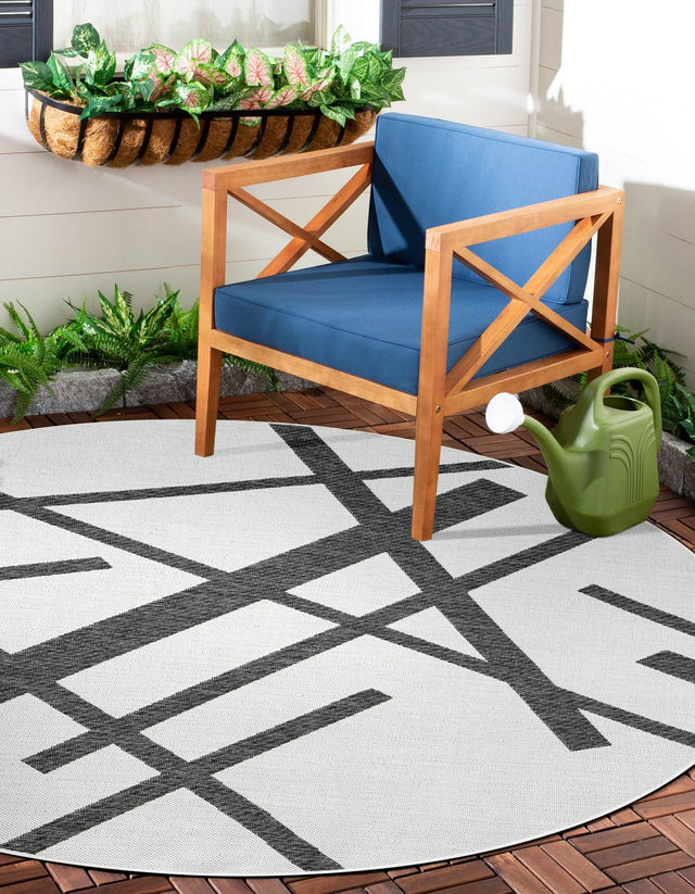 Black and White 4' 1 x 4' 1 Outdoor Modern Round Area Rug Weather Resistant for Patio, Deck, Terrace, Balcony, Porch 100% Polypropylene Modern Outside Carpet for Sale at Rug Engine