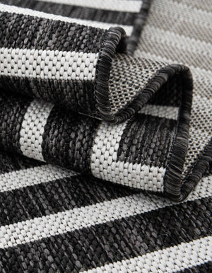 Black and White 2' x 8' Outdoor Modern Runner Area Rug Weather Resistant for Patio, Deck, Terrace, Balcony, Porch 100% Polypropylene Modern Outside Carpet for Sale at Rug Engine