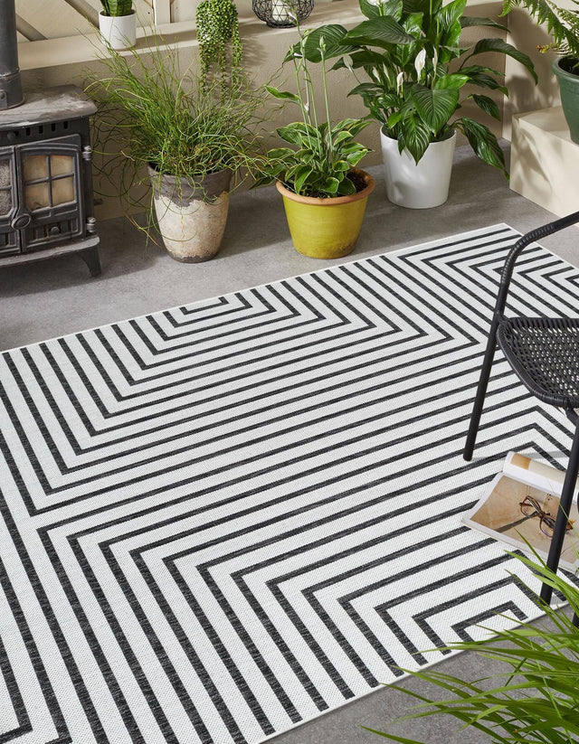 White and Black 2' x 3' 1 Outdoor Modern Rectangle Area Rug Weather Resistant for Patio, Deck, Terrace, Balcony, Porch 100% Polypropylene Modern Outside Carpet for Sale at Rug Engine