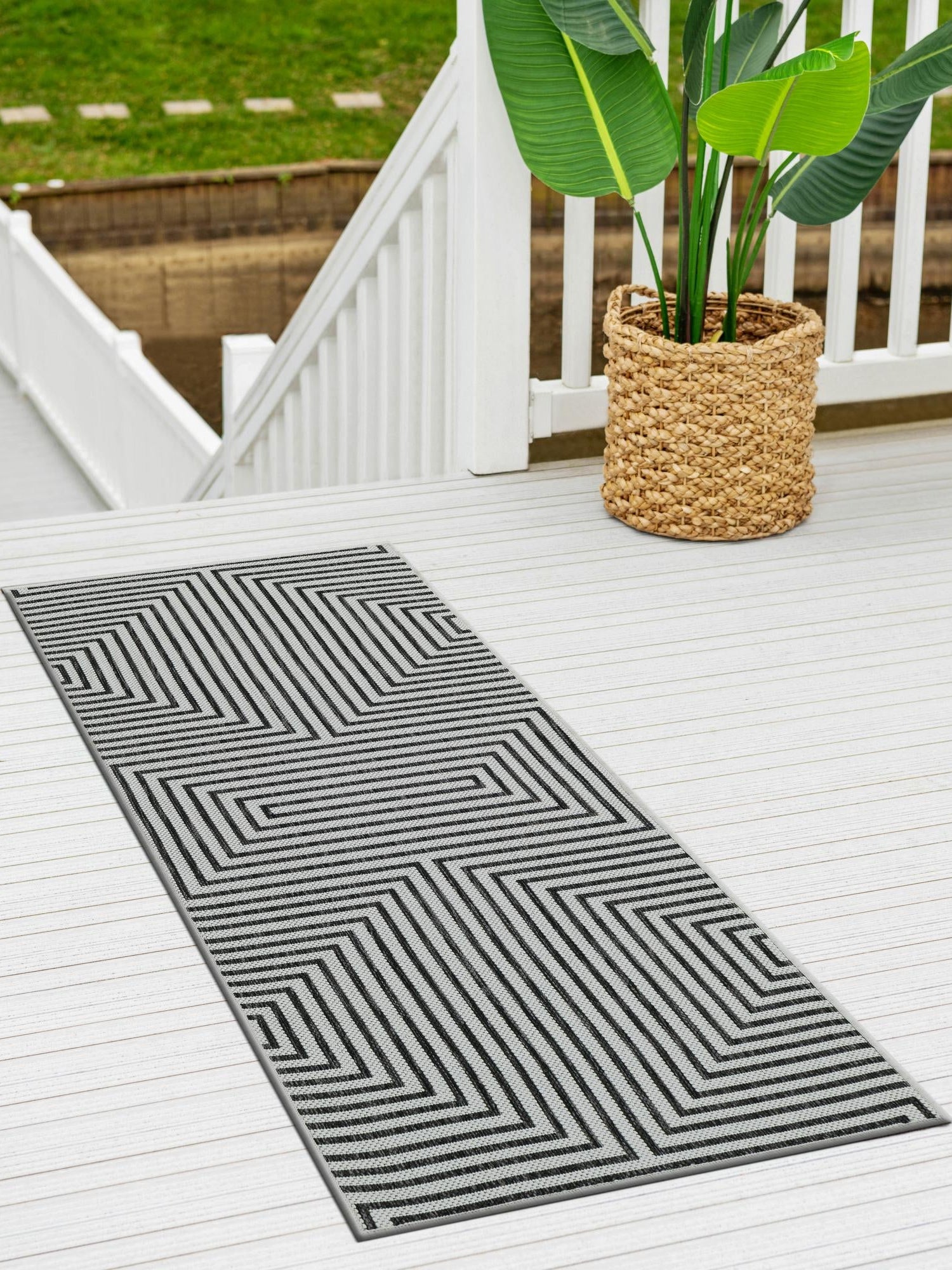 White and Black 2' x 5' 3 Outdoor Modern Runner Area Rug Weather Resistant for Patio, Deck, Terrace, Balcony, Porch 100% Polypropylene Modern Outside Carpet for Sale at Rug Engine