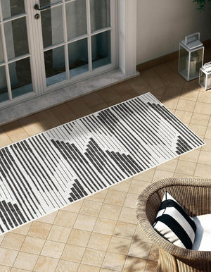 Black and White 2' x 6' 1 Outdoor Modern Runner Area Rug Weather Resistant for Patio, Deck, Terrace, Balcony, Porch 100% Polypropylene Modern Outside Carpet for Sale at Rug Engine