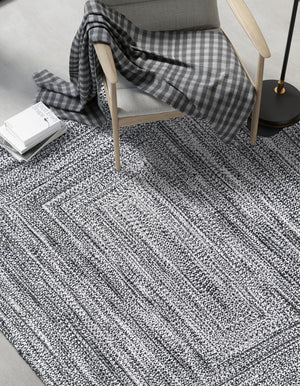 Washable Black and White 4' 1 x 6' 1 Eco Verse Indoor Outdoor Washable Rectangle Area Rug Easy to Clean Stain Resistant & Durable Weather Resistant for Patio, Deck, Terrace, Balcony, Porch 100% PET Polyester (Recycled Plastic Bottles) for Sale at Rug Engine