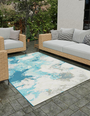 Blue and Ivory 4' 1 x 6' 1 Outdoor Modern Rectangle Area Rug Weather Resistant for Patio, Deck, Terrace, Balcony, Porch 100% Polypropylene Modern Outside Carpet for Sale at Rug Engine