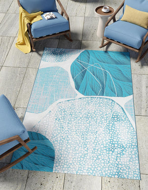 Blue and Ivory 5' 3 x 8' Outdoor Modern Rectangle Area Rug Weather Resistant for Patio, Deck, Terrace, Balcony, Porch 100% Polypropylene Modern Outside Carpet for Sale at Rug Engine