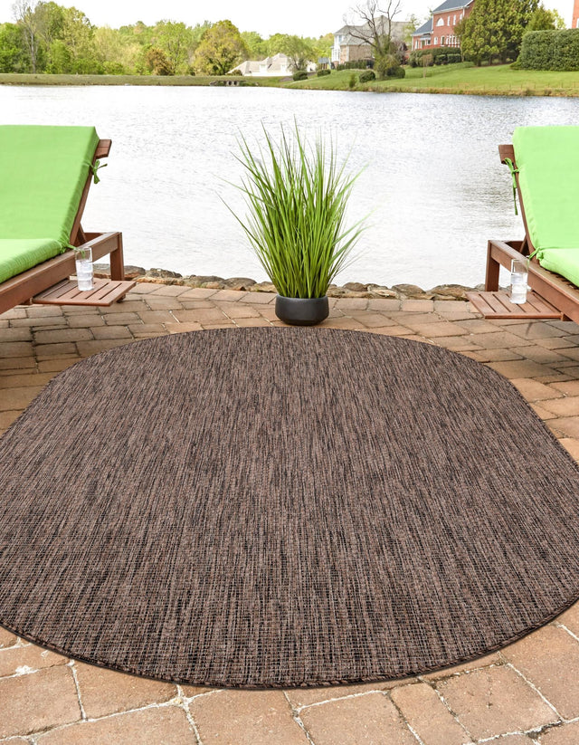 Light Brown 4' 1 x 6' 1 Outdoor Solid Oval Rug