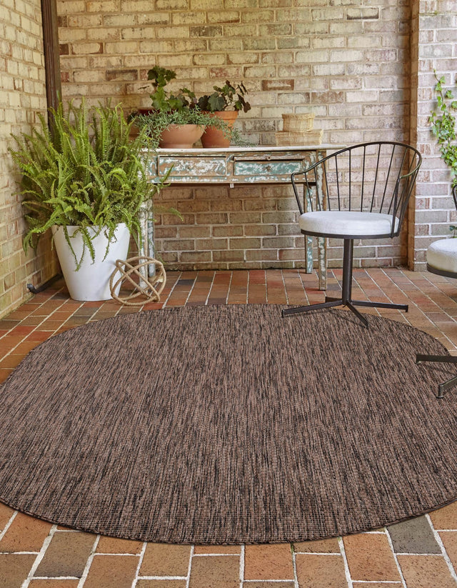 Light Brown 4' 1 x 6' 1 Outdoor Solid Oval Rug
