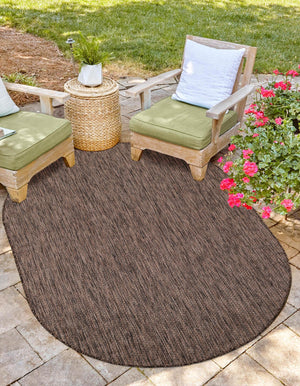 Light Brown 4' 1 x 6' 1 Outdoor Solid Oval Rug