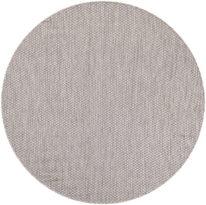 Beige 5' 3 x 5' 3 Outdoor Solid Round Area Rug Weather Resistant for Patio, Deck, Terrace, Balcony, Porch 100% Polypropylene Minimalist Waterproof Carpet for Sale at Rug Engine