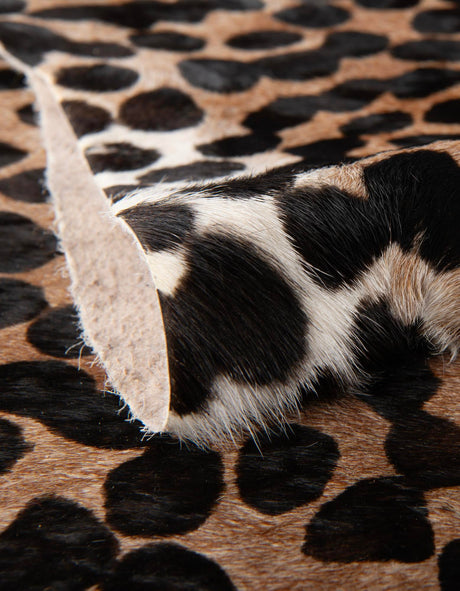 Authentic Luxury Brown and Black 5' 7 x 6' 3 Cowhide Leather Rectangle Area Rug Modern Interior Design 100% Real Natural Cowhide Carpet for Designer Home Decor for Sale at Rug Engine