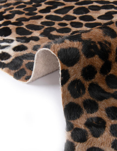 Authentic Luxury Brown and Black 5' 7 x 6' 3 Cowhide Leather Rectangle Area Rug Modern Interior Design 100% Real Natural Cowhide Carpet for Designer Home Decor for Sale at Rug Engine