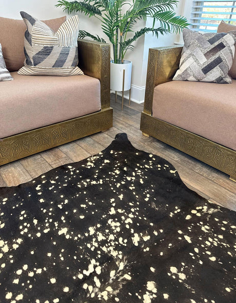 Authentic Luxury Black and Gold 5' 7 x 6' 3 Cowhide Leather Rectangle Area Rug Modern Interior Design 100% Real Natural Cowhide Carpet for Designer Home Decor for Sale at Rug Engine