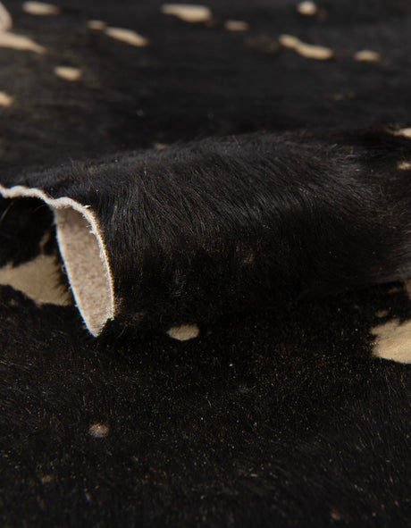 Authentic Luxury Black and Gold 5' 7 x 6' 3 Cowhide Leather Rectangle Area Rug Modern Interior Design 100% Real Natural Cowhide Carpet for Designer Home Decor for Sale at Rug Engine