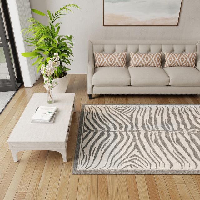 Gray and Ivory 5' 1 x 7' 1 Wildlife Rectangle Area Rug Animal Print Safari Jungle Inspired Carpet for Unique Modern Interior Design for Sale at Rug Engine