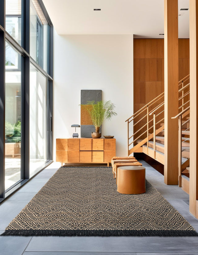 Black and Natural 4' 1 x 6' 1 Braided Jute Rectangle Rug