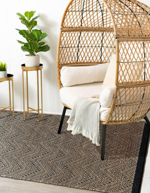 Black and Natural 4' 1 x 6' 1 Braided Jute Rectangle Rug