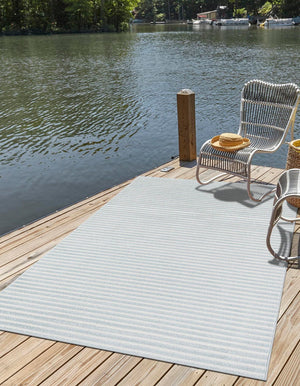 Light Blue 4' 1 x 6' 1 Sabrina Soto Outdoor Rectangle Area Rug Weather Resistant for Patio, Deck, Terrace, Balcony, Porch Durable Carpet for Exterior Home Design for Sale at Rug Engine