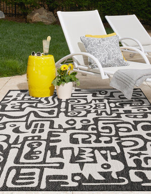 Black and White 4' 1 x 6' 1 Outdoor Modern Rectangle Area Rug Weather Resistant for Patio, Deck, Terrace, Balcony, Porch 100% Polypropylene Modern Outside Carpet for Sale at Rug Engine