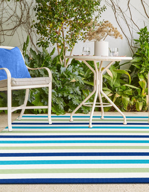 Blue and Green 4' 1 x 6' 1 Vista Breeze Outdoor Rectangle Area Rug Weather Resistant for Patio, Deck, Terrace, Balcony, Porch Colorful Vivid Modern Outside Carpet for Sale at Rug Engine